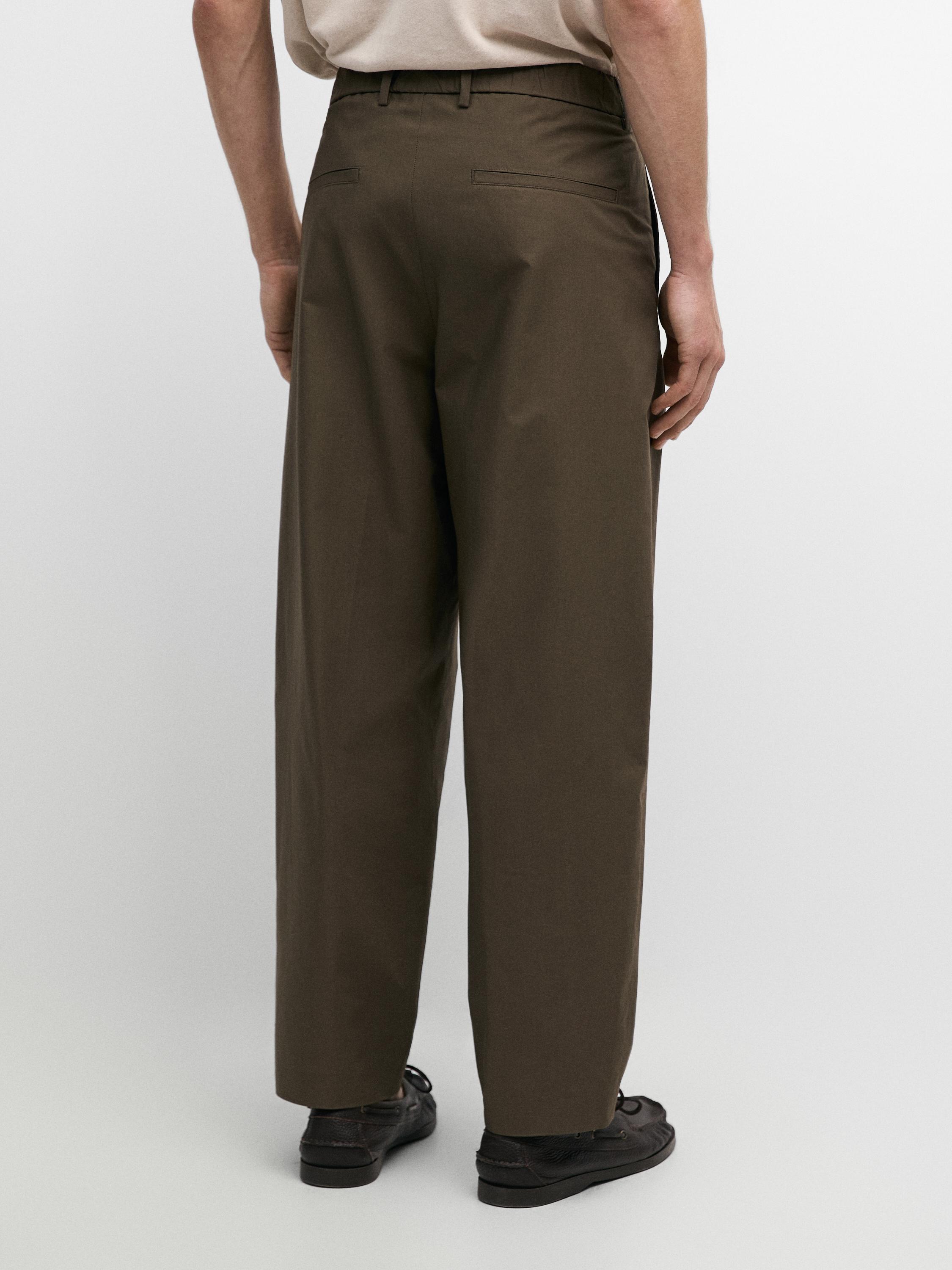 Cotton trousers with double darts